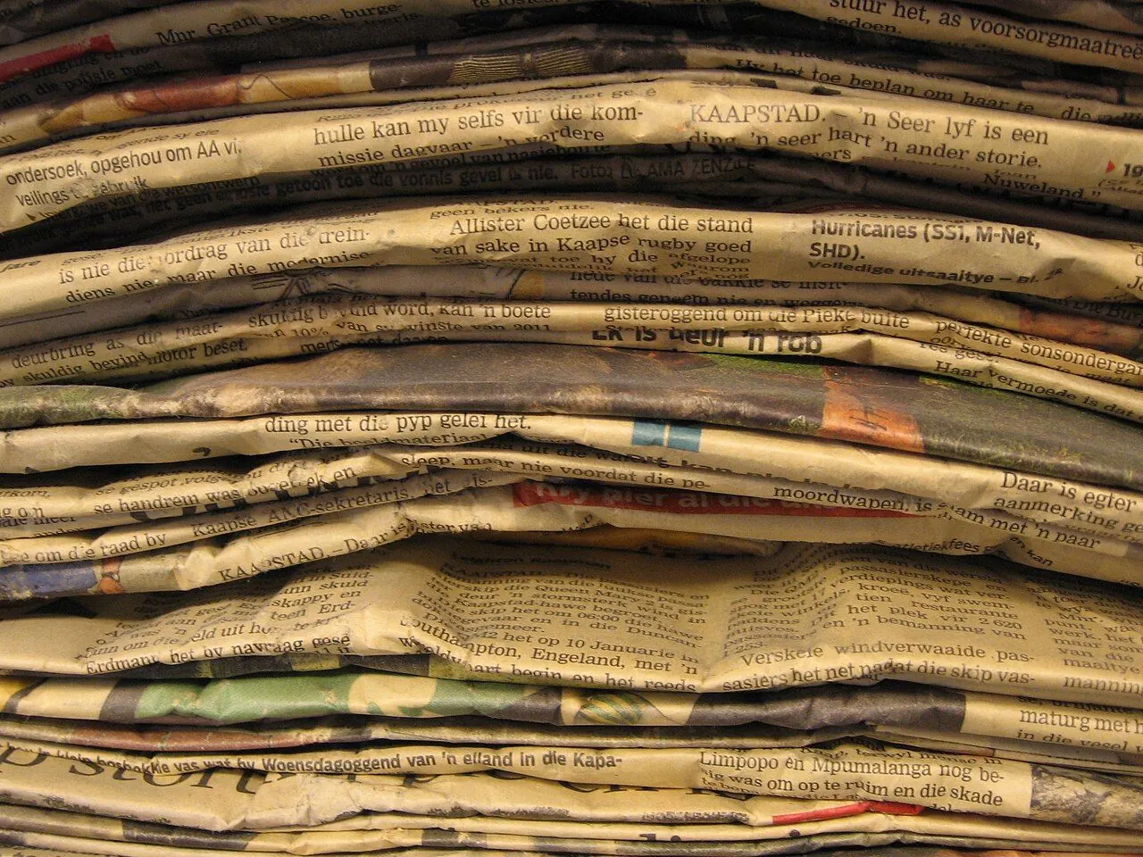 Library stack of copies of the South African newspaper Die Burger, 2012. Newspaper stack.