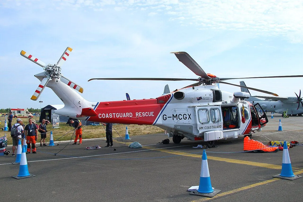 Lifeboat and coastguard helicopter during a sea rescue